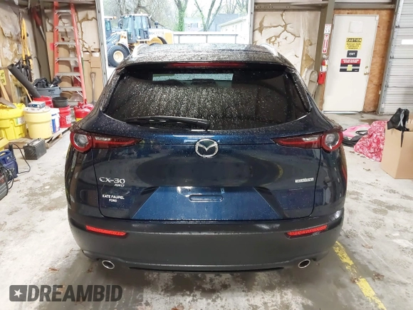 2022 Mazda CX-30 S Select z VIN 3MVDMBBL0NM440747, wystawiony jako IAAI lot #41864038 z przebiegiem 9667 mil mil oraz . Historia ofert i sprzedaży dostępna na DreamBid. Obrazek 16.