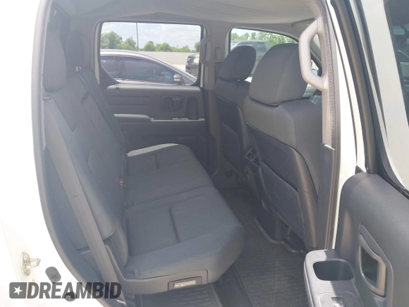 2014 Honda Ridgeline Sport with VIN 5FPYK1F71EB011340, listed as a IAAI auction lot 42741956 with 156,149 mi miles and . Bid and sale history available at DreamBid. Image 8.