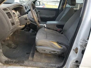 2006 Dodge Dakota SLT with VIN 1D7HE48K46S521050, listed as a Copart auction lot 87286144 with 252,799 mi miles and Salvage Title. Bid and sale history available at DreamBid. Image 7.