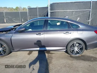 2022 Honda Accord Touring with VIN 1HGCV3F96NA011657, listed as a IAAI auction lot 41701375 with 13,681 mi miles and . Bid and sale history available at DreamBid. Image 14.