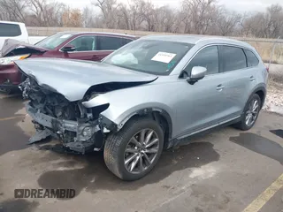 2021 Mazda CX-9 Grand Touring with VIN JM3TCBDY8M0515065, listed as a IAAI auction lot 41359765 with 80,221 mi miles and . Bid and sale history available at carsss.com. Image 18.