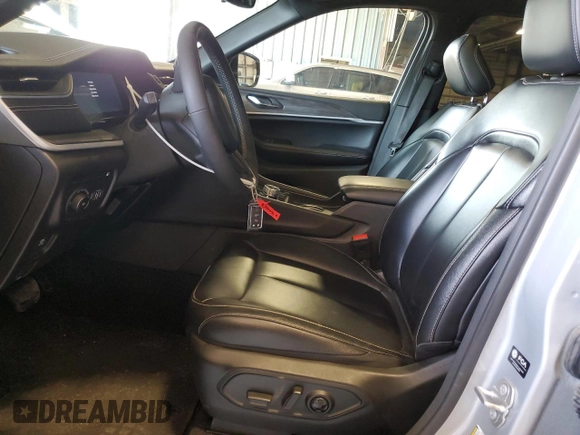 2024 Jeep Grand Cherokee with VIN 1C4RJYB65RC133675, listed as a Copart auction lot 60550065 with 51,137 mi miles and Clean title. Bid and sale history available at DreamBid. Image 7.