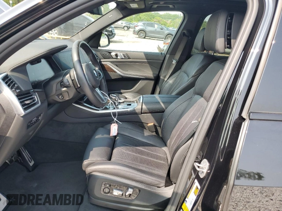 2021 BMW X5 xDrive40i with VIN 5UXCR6C07M9H68711, listed as a Copart auction lot 58984535 with 35,826 mi miles and Salvage title. Bid and sale history available at DreamBid. Image 7.
