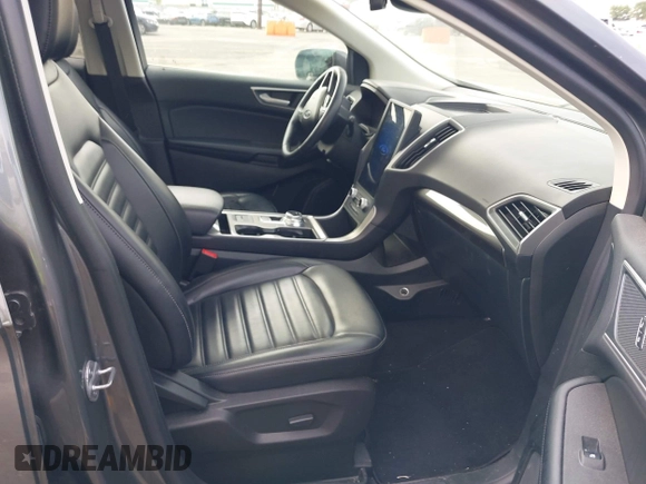 2023 Ford Edge SEL z VIN 2FMPK4J98PBA03830, wystawiony jako IAAI lot #41992054 z przebiegiem 21 081 mil mil oraz . Historia ofert i sprzedaży dostępna na DreamBid. Obrazek 5.