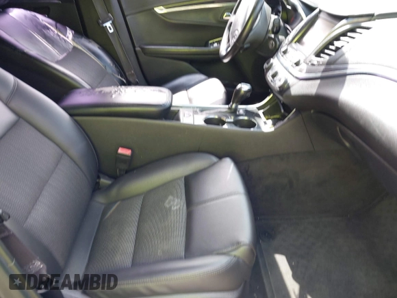 2016 Chevrolet Impala LT z VIN 2G1115S31G9128052, wystawiony jako IAAI lot #42302597 z przebiegiem 120 590 mil mil oraz . Historia ofert i sprzedaży dostępna na DreamBid. Obrazek 5.