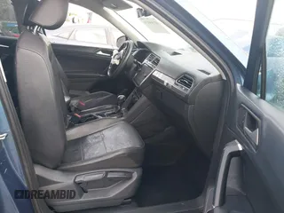 2020 Volkswagen Tiguan SE z VIN 3VV3B7AX5LM176136, wystawiony jako IAAI lot #41564431 z przebiegiem 74 867 mil mil oraz . Historia ofert i sprzedaży dostępna na DreamBid. Obrazek 5.