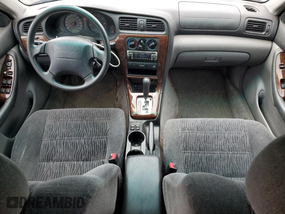 2002 Subaru Legacy Outback with VIN 4S3BH675927625674, listed as a Copart auction lot 59681475 with 302,635 mi miles and Salvage title. Bid and sale history available at DreamBid. Image 8.