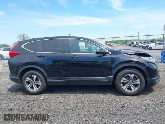 2019 Honda CR-V LX z VIN 2HKRW6H31KH208188, wystawiony jako IAAI lot #42235856 z przebiegiem 140 067 mil mil oraz . Historia ofert i sprzedaży dostępna na DreamBid. Obrazek 13.