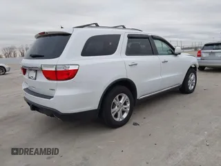 2013 Dodge Durango Crew with VIN 1C4RDHDG5DC617061, listed as a IAAI auction lot 41385801 with 142,304 mi miles. Bid and sale history available at carsss.com. Image 4.