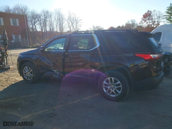 2019 Chevrolet Traverse LT Cloth with VIN 1GNEVGKW0KJ103392, listed as a IAAI auction lot 40702731 with 77,025 mi miles. Bid and sale history available at carsss.com. Image 14.