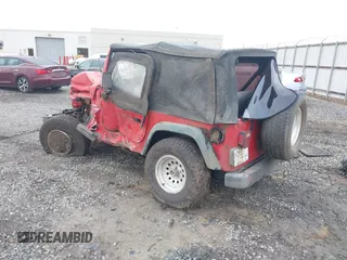 1997 Jeep Wrangler Sport z VIN 1J4FY19S2VP426553, wystawiony jako IAAI lot #41917764 z przebiegiem 154 140 mil mil oraz . Historia ofert i sprzedaży dostępna na DreamBid. Obrazek 3.