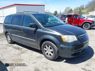 2012 Chrysler Town & Country Touring with VIN 2C4RC1BG9CR313105, listed as a IAAI auction lot 41971919 with 165,986 mi miles. Bid and sale history available at carsss.com. Image 1.