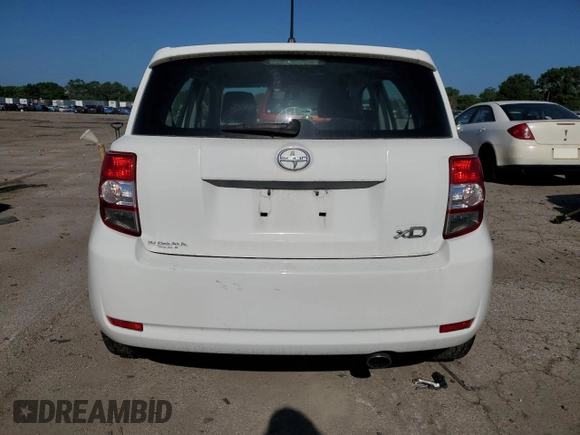2009 Scion xD with VIN JTKKU10439J046749, listed as a Copart auction lot 60918345 with 126,995 mi miles and Salvage title. Bid and sale history available at DreamBid. Image 6.