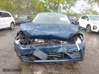 2018 Volkswagen Passat 2.0T S with VIN 1VWAA7A30JC021740, listed as a IAAI auction lot 41887035 with 65,227 mi miles. Bid and sale history available at carsss.com. Image 13.