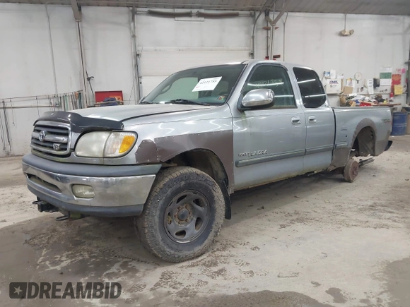 2001 Toyota Tundra SR5 with VIN 5TBBT441215169714, listed as a IAAI auction lot 42121755 with 130,202 mi miles and . Bid and sale history available at carsss.com. Image 2.