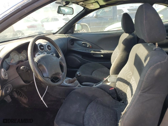 2001 Hyundai Tiburon with VIN KMHJG25F11U261457, listed as a Copart auction lot 43012635 with 165,625 mi miles and Salvage Title. Bid and sale history available at carsss.com. Image 7.