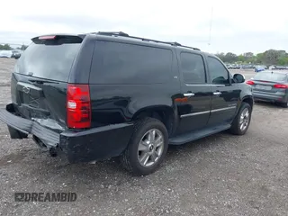 2010 Chevrolet Suburban LTZ with VIN 1GNUCKE02AR220449, listed as a IAAI auction lot 41665749 with 264,447 mi miles and . Bid and sale history available at DreamBid. Image 4.
