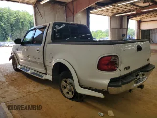 2001 Ford F-150 XLT with VIN 1FTRW07W51KE03221, listed as a Copart auction lot 63628855 with 237,510 mi miles and Salvage title. Bid and sale history available at DreamBid. Image 2.