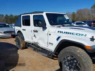 2023 Jeep Wrangler Rubicon with VIN 1C4JJXR64PW586369, listed as a IAAI auction lot 41587561 with 16,038 mi miles and . Bid and sale history available at DreamBid. Image 6.