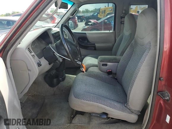 1998 Ford Ranger XL with VIN 1FTZR15UXWPA17399, listed as a Copart auction lot 60555045 with 381,232 mi miles and Salvage title. Bid and sale history available at DreamBid. Image 7.