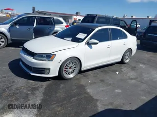 2014 Volkswagen Jetta GLI Autobahn with VIN 3VW5T7AJ8EM367002, listed as a IAAI auction lot 42032055 with 186,301 mi miles and . Bid and sale history available at DreamBid. Image 2.