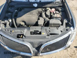 2014 Lincoln MKS z VIN 1LNHL9DK3EG606655, wystawiony jako Copart lot #42008655 z przebiegiem 100 886 mil mil oraz Szkoda całkowita • Salvage title. Historia ofert i sprzedaży dostępna na DreamBid. Obrazek 12.