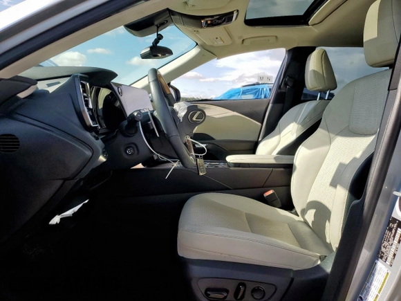 2023 Lexus RX 350 with VIN 2T2BAMBA4PC022193, listed as a Copart auction lot 58991955 with 18,696 mi miles and Salvage title. Bid and sale history available at DreamBid. Image 7.