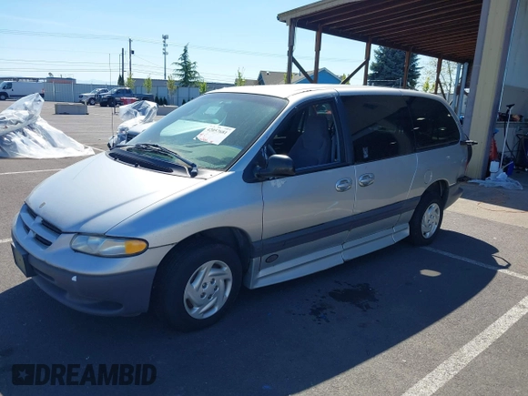 2000 Dodge Caravan SE with VIN 1B4GP44G1YB680819, listed as a IAAI auction lot 42057681 with 23,422 mi miles. Bid and sale history available at carsss.com. Image 16.