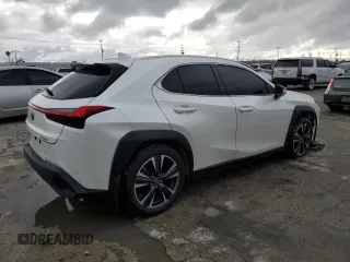 2021 Lexus UX 200 with VIN JTHX3JBHXM2040304, listed as a Copart auction lot 49006725 with 51,543 mi miles and Salvage title. Bid and sale history available at DreamBid. Image 3.