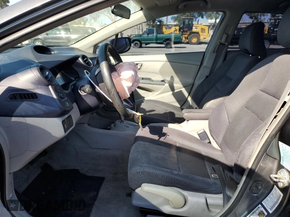 2010 Honda Insight EX z VIN JHMZE2H73AS034380, wystawiony jako Copart lot #49178935 z przebiegiem 214 256 mil mil oraz Szkoda całkowita • Salvage title. Historia ofert i sprzedaży dostępna na DreamBid. Obrazek 7.