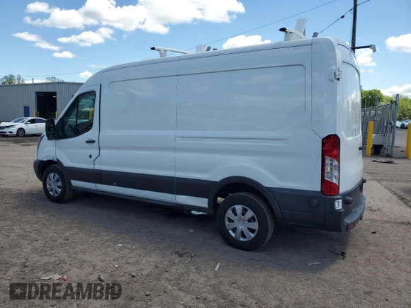 2015 Ford Transit with VIN 1FTNR2CV1FKA35481, listed as a Copart auction lot 56309875 with 129,822 mi miles and Clean Title. Bid and sale history available at DreamBid. Image 2.