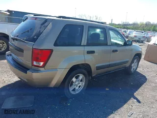 2005 Jeep Grand Cherokee Laredo with VIN 1J4GR48K25C714911, listed as a IAAI auction lot 41987103 with 191,157 mi miles. Bid and sale history available at carsss.com. Image 4.