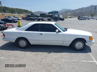 1991 Mercedes-Benz 560 with VIN WDBCA45E7MA610580, listed as a IAAI auction lot 42099161 with 83,344 mi miles and . Bid and sale history available at DreamBid. Image 13.