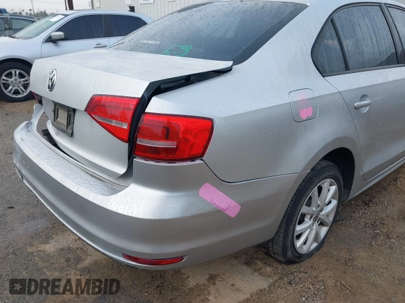 2015 Volkswagen Jetta Sport with VIN 3VWD17AJ5FM307746, listed as a IAAI auction lot 41506413 with 113,297 mi miles and . Bid and sale history available at DreamBid. Image 12.