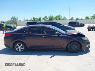 2014 Kia Optima LX with VIN 5XXGM4A77EG274839, listed as a IAAI auction lot 41976091 with 130,517 mi miles. Bid and sale history available at carsss.com. Image 13.
