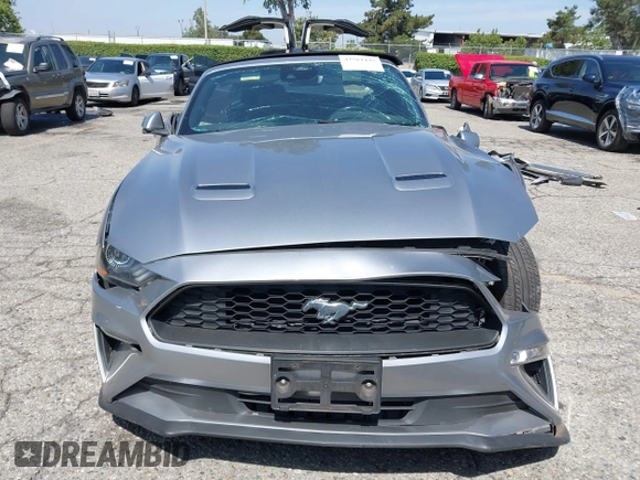 2021 Ford Mustang EcoBoost z VIN 1FATP8UH2M5120162, wystawiony jako IAAI lot #42561125 z przebiegiem 55 360 mil mil oraz . Historia ofert i sprzedaży dostępna na DreamBid. Obrazek 13.