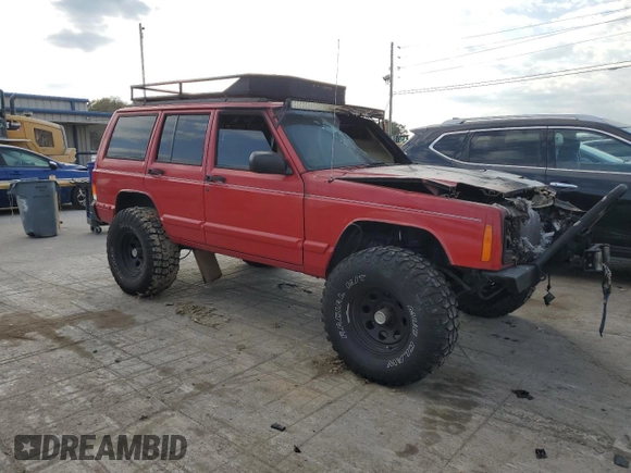 1997 Jeep Cherokee Country with VIN 1J4FJ78S3VL520344, listed as a Copart auction lot 77798264 with 0 mi miles and Salvage Title. Bid and sale history available at carsss.com. Image 4.