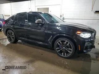 2020 BMW X4 M40i with VIN 5UX2V5C07L9B70294, listed as a Copart auction lot 47483825 with 62,407 mi miles and Salvage title. Bid and sale history available at DreamBid. Image 4.