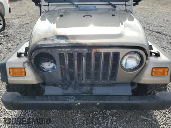 2003 Jeep Wrangler X с VIN 1J4FA39S03P349713, выставлен на аукционе Copart как лот 55768995 с пробегом 187 266 миль миль и Списание • Salvage title. История ставок и продаж доступна на DreamBid. Изображение 11.