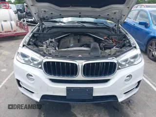 2014 BMW X5 sDrive35i z VIN 5UXKR2C54E0H34800, wystawiony jako IAAI lot #42110978 z przebiegiem 106 891 mil mil oraz . Historia ofert i sprzedaży dostępna na DreamBid. Obrazek 10.