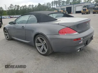 2007 BMW 6 Series M6 z VIN WBSEK93557CY78648, wystawiony jako Copart lot #52179345 z przebiegiem 22 453 mil mil oraz Szkoda całkowita • Salvage title. Historia ofert i sprzedaży dostępna na DreamBid. Obrazek 2.