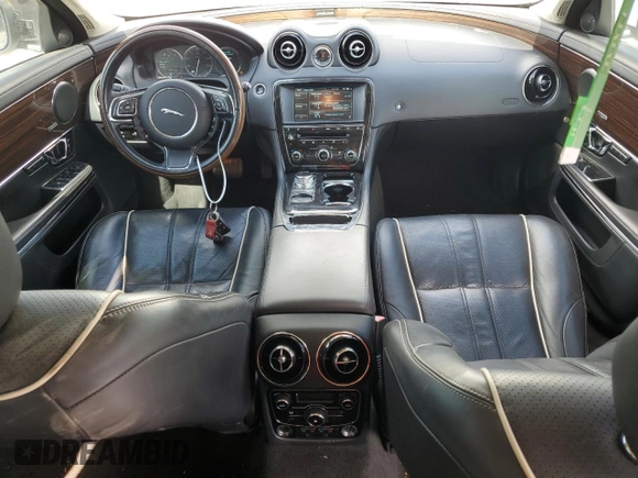 2014 Jaguar XJ with VIN SAJWA2GZ3E8V70365, listed as a Copart auction lot 42545995 with 65,649 mi miles and Salvage Title. Bid and sale history available at carsss.com. Image 8.
