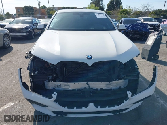 2022 BMW X6 M50i z VIN 5UXCY8C01N9J14882, wystawiony jako IAAI lot #41856966 z przebiegiem 22 893 mil mil oraz . Historia ofert i sprzedaży dostępna na DreamBid. Obrazek 13.