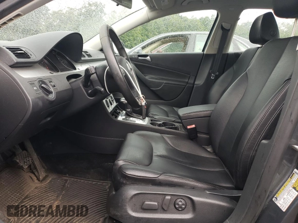 2009 Volkswagen Passat Komfort z VIN WVWJK73CX9P055380, wystawiony jako Copart lot #65812774 z przebiegiem 170 237 mil mil oraz Czysty tytuł • Clean title. Historia ofert i sprzedaży dostępna na DreamBid. Obrazek 7.