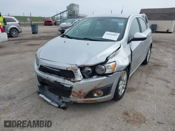 2012 Chevrolet Sonic LT with VIN 1G1JC5SHXC4170853, listed as a IAAI auction lot 41941069 with 130,917 mi miles and . Bid and sale history available at DreamBid. Image 6.