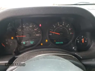 2007 Jeep Wrangler Unlimited X with VIN 1J4GA39117L119395, listed as a Copart auction lot 52588055 with 160,335 mi miles and Salvage title. Bid and sale history available at DreamBid. Image 9.