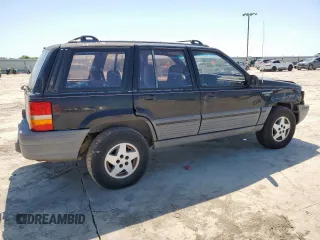 1995 Jeep Grand Cherokee Laredo z VIN 1J4FX58S9SC534442, wystawiony jako Copart lot #61233725 z przebiegiem 363 688 mil mil oraz Szkoda całkowita • Salvage title. Historia ofert i sprzedaży dostępna na DreamBid. Obrazek 3.