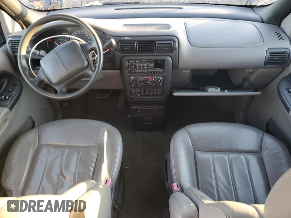 1999 Chevrolet Venture z VIN 1GNDX03E6XD330398, wystawiony jako Copart lot #77621004 z przebiegiem 80 625 mil mil oraz Szkody całkowita. Historia ofert i sprzedaży dostępna na DreamBid. Obrazek 8.