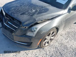 2015 Cadillac ATS Sedan Luxury RWD with VIN 1G6AB5RX4F0122156, listed as a IAAI auction lot 42012891 with 137,879 mi miles. Bid and sale history available at carsss.com. Image 6.