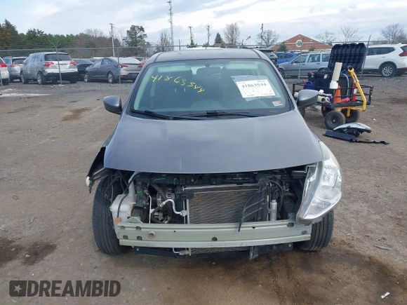 2019 Nissan Versa SV with VIN 3N1CN7AP7KL863891, listed as a IAAI auction lot 41863544 with 90,000 mi miles and . Bid and sale history available at DreamBid. Image 13.